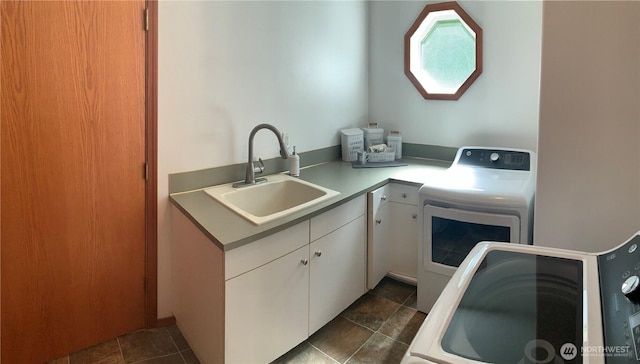 3328 Pennsylvania, Longview, WA 98632 - kitchen with washer and clothes dryer, white cabinetry, and light countertops