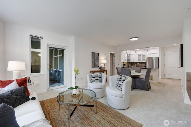 5450 Leary Ave NW Unit 251, Seattle, WA 98107 - living area featuring light carpet and baseboards