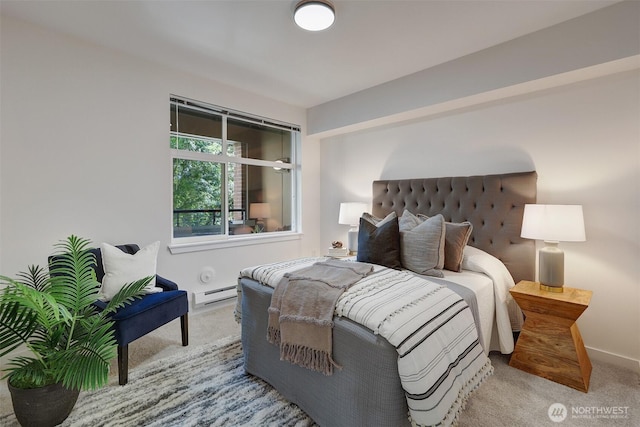 5450 Leary Ave NW Unit 251, Seattle, WA 98107 - bedroom featuring a baseboard heating unit, carpet, and baseboards