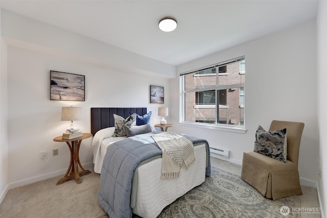 5450 Leary Ave NW Unit 251, Seattle, WA 98107 - bedroom featuring a baseboard heating unit, carpet, and baseboards