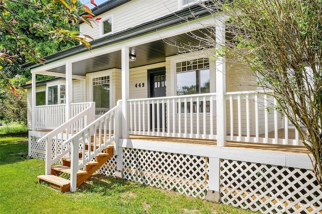 449 NE Cliff Ave, Wilbur, WA 99185 - doorway to property featuring a porch and a lawn
