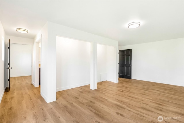 449 NE Cliff Ave, Wilbur, WA 99185 - empty room with light wood-style floors and baseboards