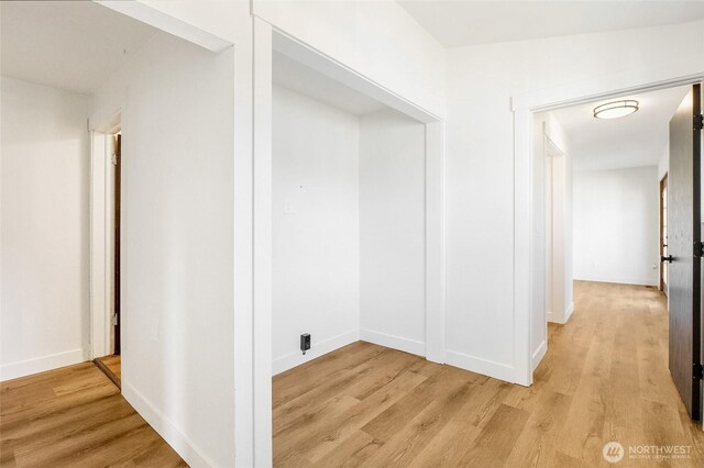 449 NE Cliff Ave, Wilbur, WA 99185 - hallway with light wood finished floors and baseboards
