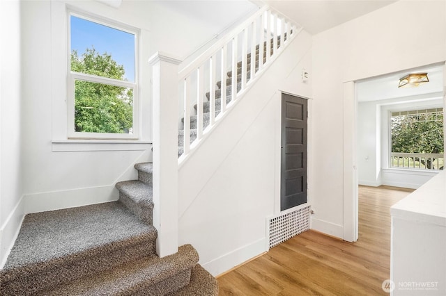 449 NE Cliff Ave, Wilbur, WA 99185 - stairway with baseboards and wood finished floors