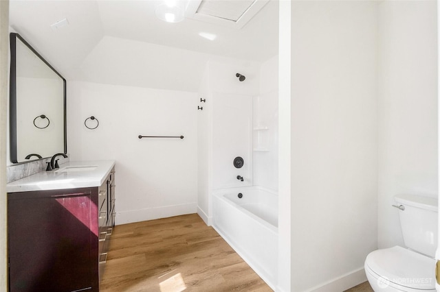 449 NE Cliff Ave, Wilbur, WA 99185 - full bathroom featuring vanity, wood finished floors, toilet, shower / bath combination, and baseboards