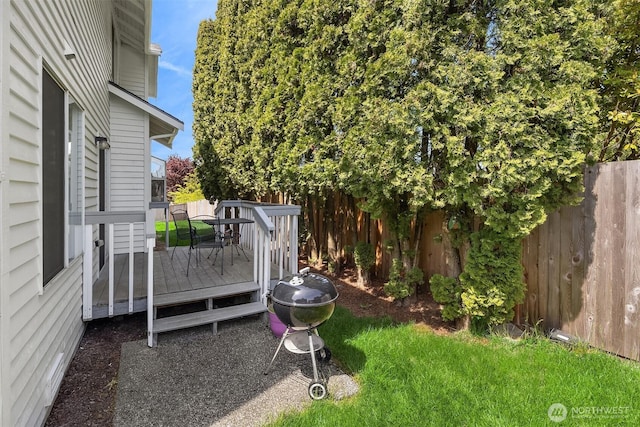 600 213th St SW, Bothell, WA 98021 - fenced backyard featuring a wooden deck
