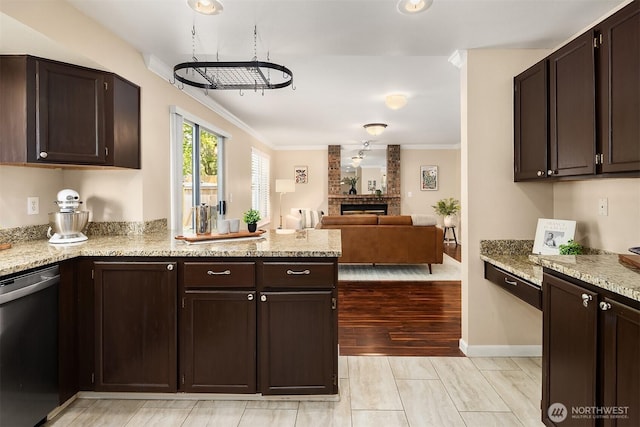 600 213th St SW, Bothell, WA 98021 - kitchen with dishwasher, a peninsula, crown molding, dark brown cabinets, and a fireplace