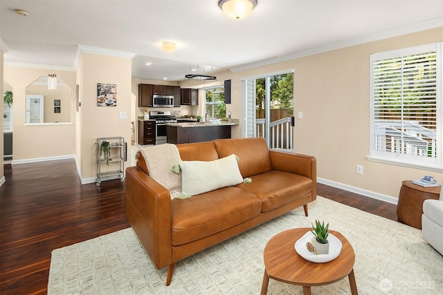 600 213th St SW, Bothell, WA 98021 - living area featuring wood finished floors, crown molding, and recessed lighting