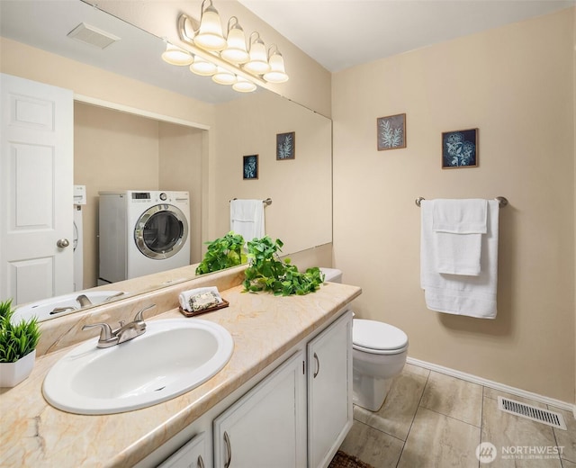 600 213th St SW, Bothell, WA 98021 - bathroom with washer / dryer and vanity