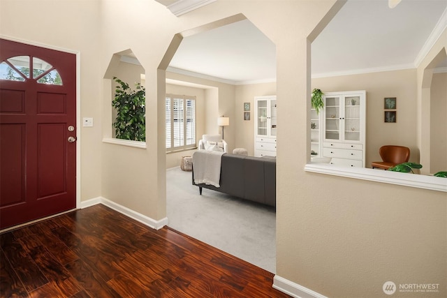 600 213th St SW, Bothell, WA 98021 - entrance foyer featuring ornamental molding, dark wood-style flooring, and arched walkways