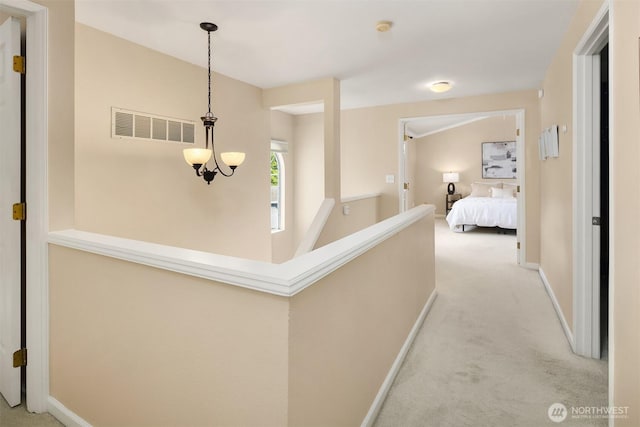 600 213th St SW, Bothell, WA 98021 - corridor with light colored carpet and a chandelier