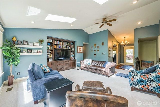 804 S Park Ct, Lynden, WA 98264 - living room with lofted ceiling, carpet flooring, a chandelier, a skylight, and a ceiling fan