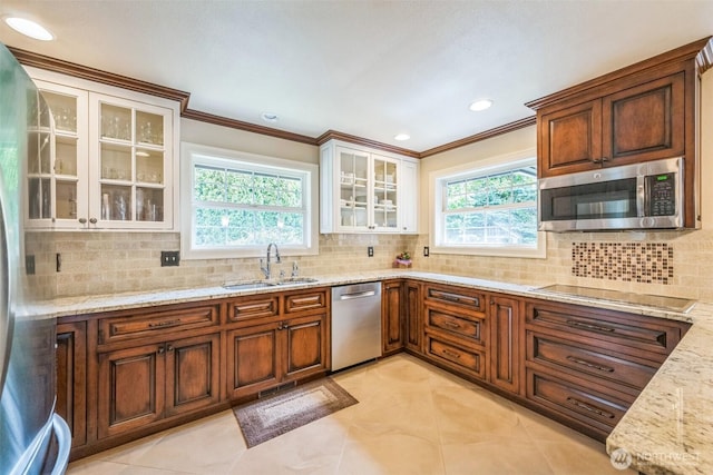804 S Park Ct, Lynden, WA 98264 - kitchen featuring stainless steel appliances, light stone countertops, ornamental molding, backsplash, and recessed lighting