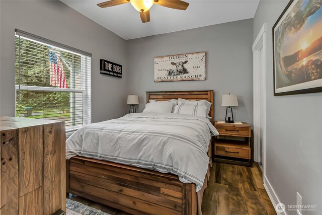 17501 Clearlake Blvd SE, Yelm, WA 98597 - bedroom featuring dark wood-style flooring and ceiling fan