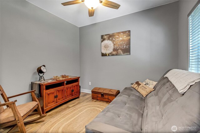 17501 Clearlake Blvd SE, Yelm, WA 98597 - living area with ceiling fan, light wood finished floors, and plenty of natural light