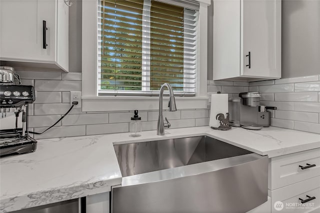 17501 Clearlake Blvd SE, Yelm, WA 98597 - kitchen featuring decorative backsplash, white cabinets, and plenty of natural light