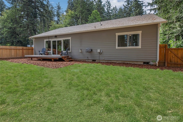17501 Clearlake Blvd SE, Yelm, WA 98597 - back of house with a fenced backyard and a wooden deck