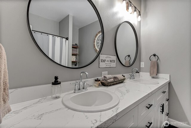 17501 Clearlake Blvd SE, Yelm, WA 98597 - bathroom featuring double vanity