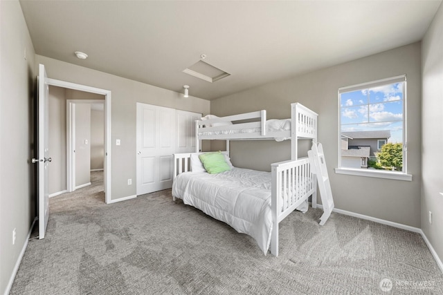 7114 Hazel Pl SE, Auburn, WA 98092 - bedroom featuring attic access, carpet, and a closet