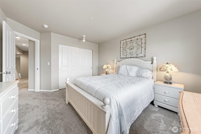 7114 Hazel Pl SE, Auburn, WA 98092 - bedroom featuring light carpet and a closet