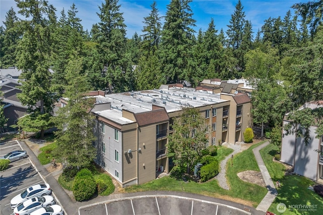 14600 NE 32nd St Unit I4, Bellevue, WA 98007 - view of building exterior featuring uncovered parking
