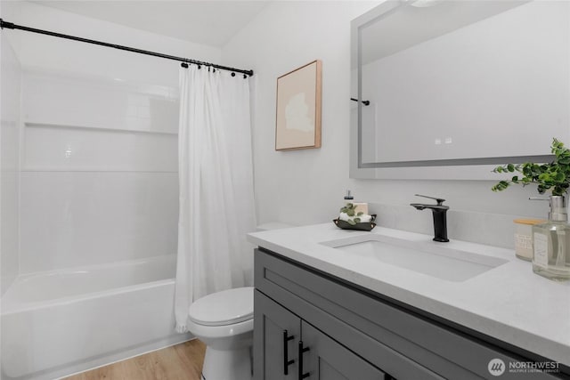 14600 NE 32nd St Unit I4, Bellevue, WA 98007 - full bathroom featuring vanity, wood finished floors, and shower / bath combo