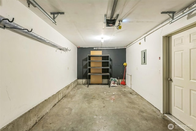 1124 S 23rd St, Tacoma, WA 98405 - garage with electric panel and a garage door opener