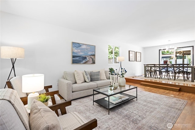 15052 253rd Ave SE, Issaquah, WA 98027 - living room with a chandelier, healthy amount of natural light, and wood finished floors