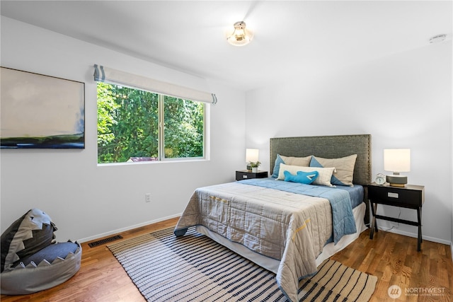 15052 253rd Ave SE, Issaquah, WA 98027 - bedroom with baseboards and wood finished floors