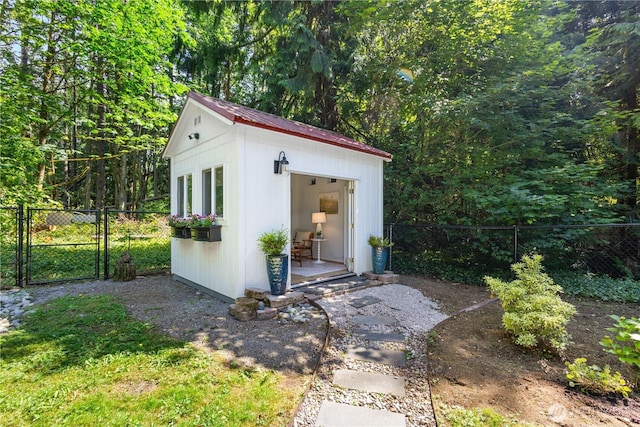 15052 253rd Ave SE, Issaquah, WA 98027 - view of outbuilding with a gate and a view of trees