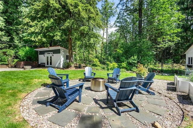 15052 253rd Ave SE, Issaquah, WA 98027 - view of patio featuring a fire pit, french doors, an outbuilding, and a jacuzzi