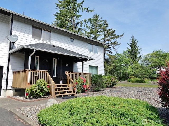 801 Hassalo Ave SE, Ocean Shores, WA 98569 - view of front of property with a porch