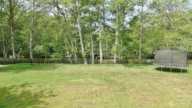 801 Hassalo Ave SE, Ocean Shores, WA 98569 - view of yard featuring a trampoline