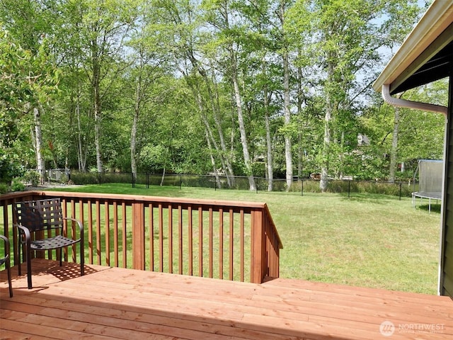 801 Hassalo Ave SE, Ocean Shores, WA 98569 - wooden deck with a trampoline