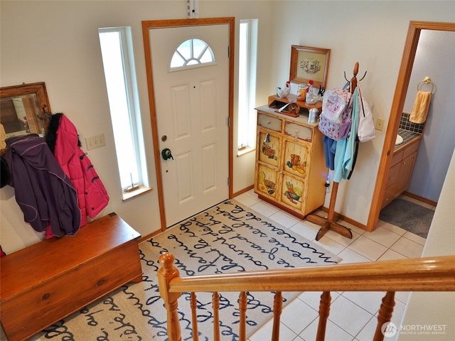 801 Hassalo Ave SE, Ocean Shores, WA 98569 - foyer with light tile patterned flooring and baseboards