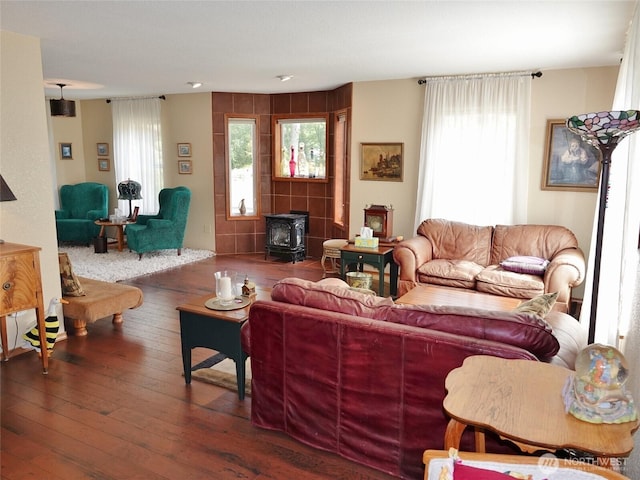 801 Hassalo Ave SE, Ocean Shores, WA 98569 - living room featuring a wood stove, hardwood / wood-style floors, and healthy amount of natural light
