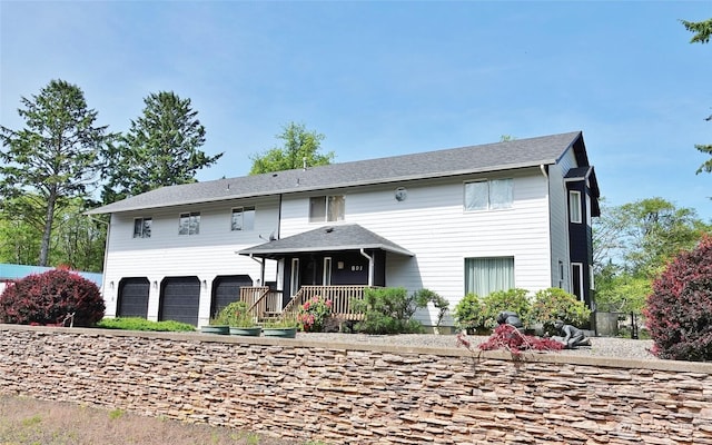 801 Hassalo Ave SE, Ocean Shores, WA 98569 - view of front of home featuring a garage