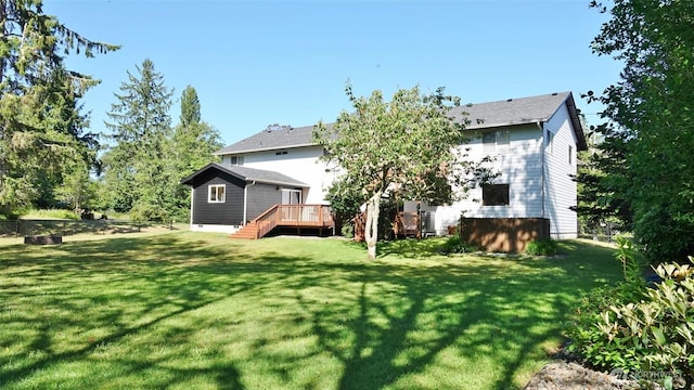 801 Hassalo Ave SE, Ocean Shores, WA 98569 - back of house with a wooden deck, a yard, and stairs