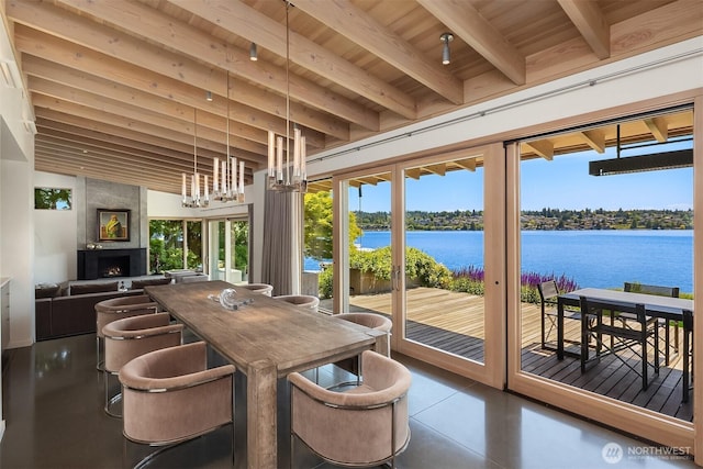 7964 E Mercer Way, Mercer Island, WA 98040 - sunroom featuring a water view, beamed ceiling, and a chandelier