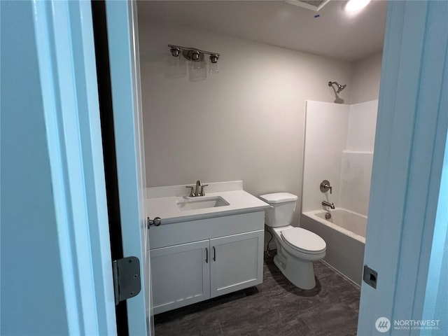 507 N Ruddy Blvd, Moses Lake, WA 98837 - bathroom featuring toilet, vanity, and bathing tub / shower combination