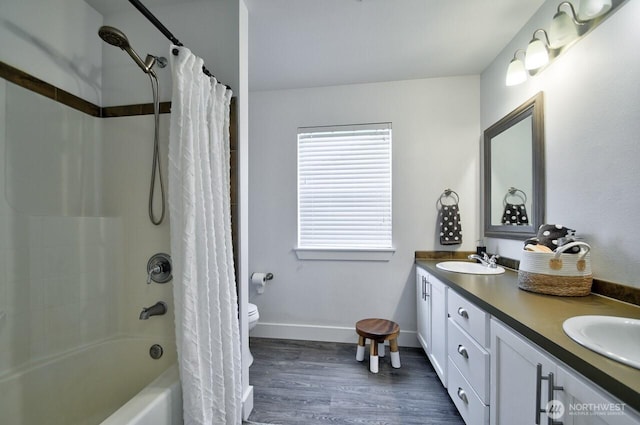 4704 204th Ct E, Spanaway, WA 98387 - full bathroom featuring double vanity, wood finished floors, and shower / bath combination with curtain
