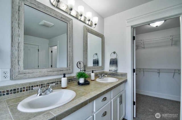 4704 204th Ct E, Spanaway, WA 98387 - full bathroom featuring double vanity and a walk in closet