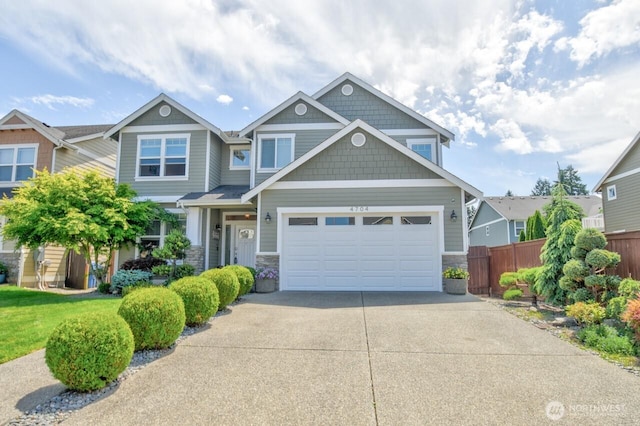 4704 204th Ct E, Spanaway, WA 98387 - craftsman-style home with driveway and stone siding