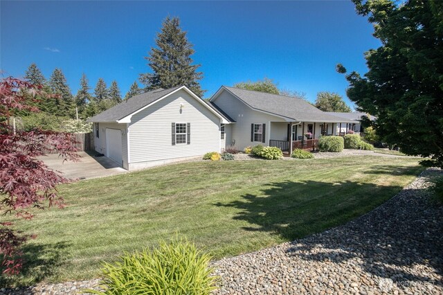 108 Garden Pl, Elma, WA 98541 - view of front of property with covered porch, a garage, a front yard, and driveway