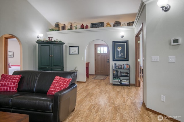 108 Garden Pl, Elma, WA 98541 - foyer with arched walkways, light wood-style floors, and baseboards