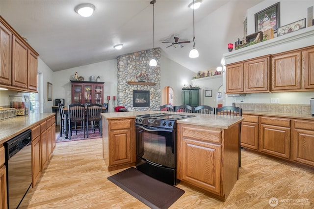 108 Garden Pl, Elma, WA 98541 - kitchen featuring dishwasher, black electric range oven, a ceiling fan, a center island, and light wood finished floors