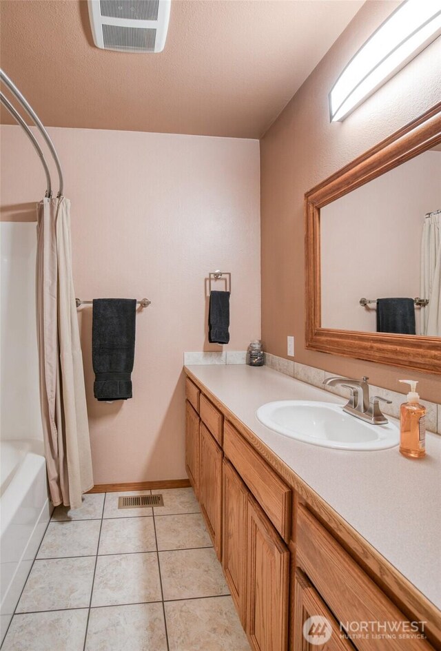 108 Garden Pl, Elma, WA 98541 - bathroom featuring vanity, tile patterned floors, and shower / bath combo