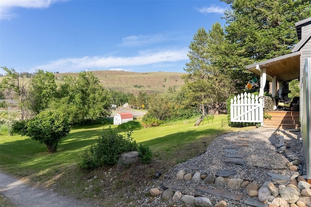 111 Norfolk Rd, Winthrop, WA 98862 - view of green lawn with a shed