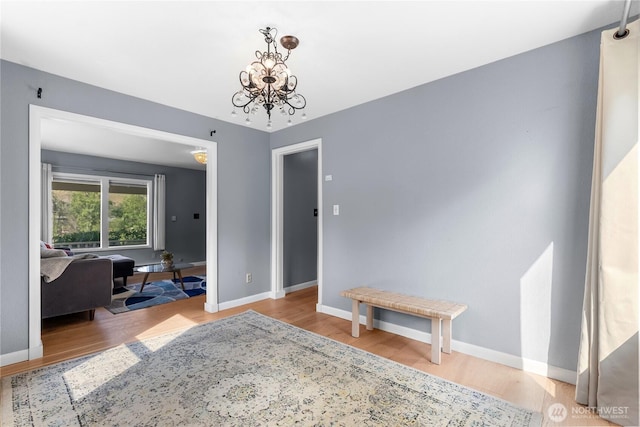 111 Norfolk Rd, Winthrop, WA 98862 - foyer entrance featuring wood finished floors and a chandelier