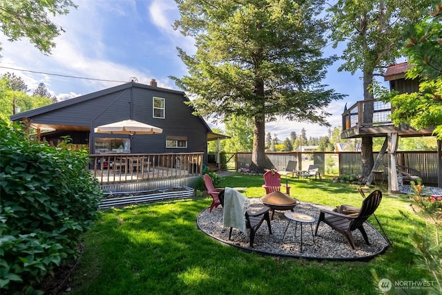 111 Norfolk Rd, Winthrop, WA 98862 - view of yard featuring a fire pit and a wooden deck